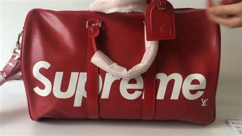 fake black supreme duffle bag|supreme crossbody bag men's.